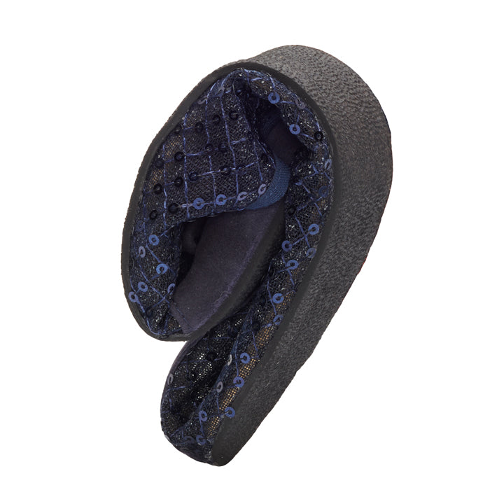 A ZAQQ Comfortable dark gray slippers feature a textured, non-slip sole and an inner lining with the TWIST SHEER Blue pattern. Positioned vertically on a white background, it highlights its padded comfort and intricate design.