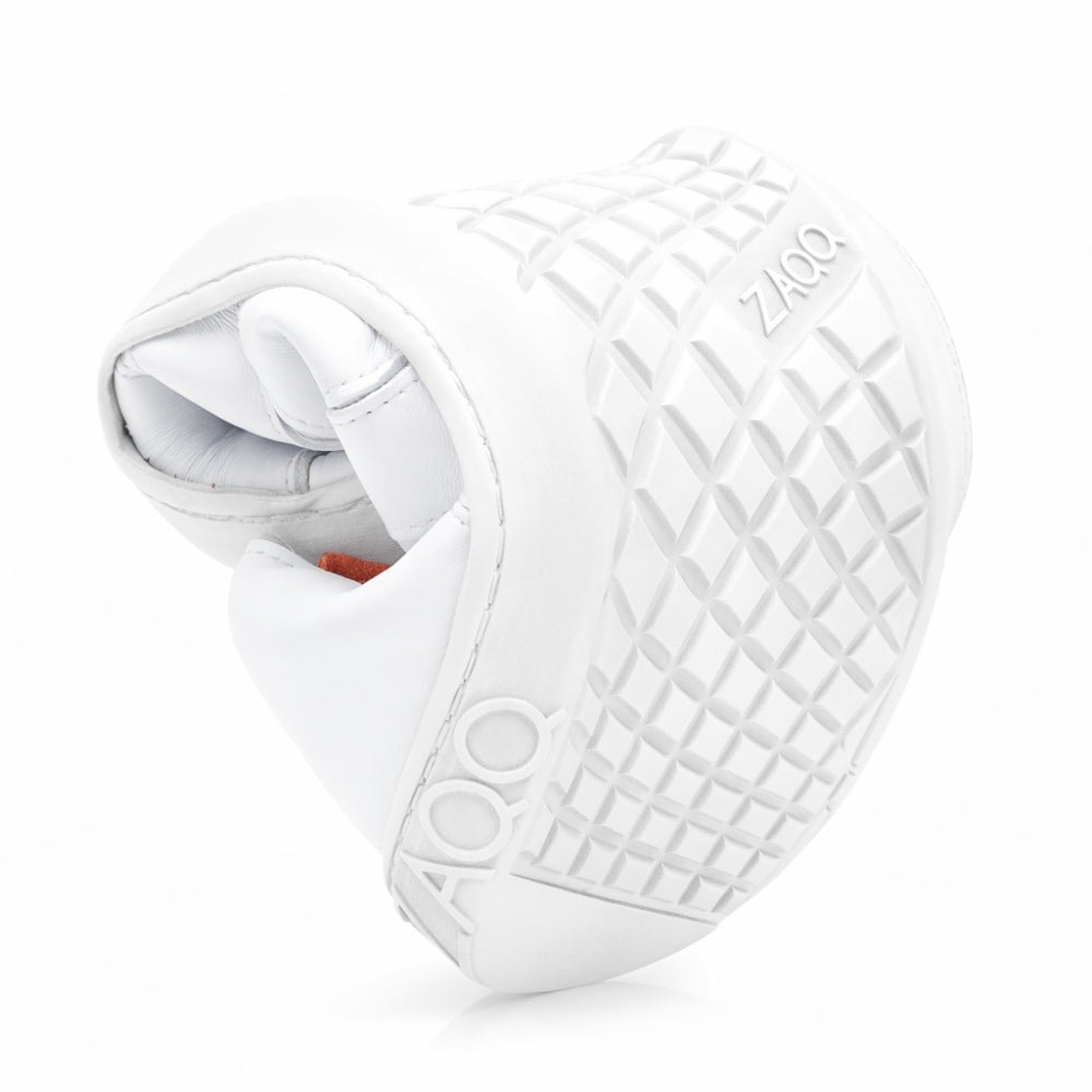 The QQQ Low White, a flexible barefoot shoe from ZAQQ, is curved in the middle to emphasize its flexibility. Its breathable sole has a diamond structure and the brand name ZAQQ is visible on both the side and bottom. This image highlights the remarkable flexibility of the shoe, which is made from premium Nappa leather.