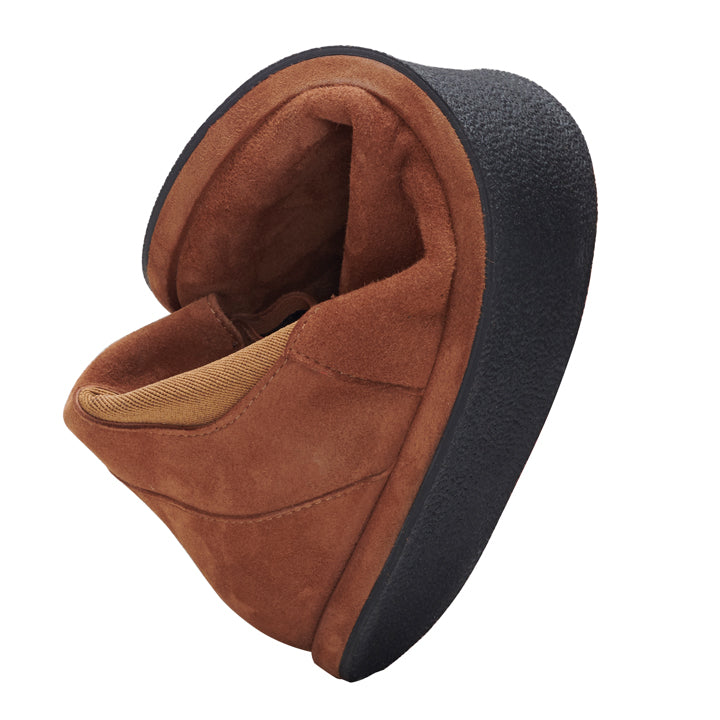 The EQUITY Cognac is presented by ZAQQ, which features a flexible design with brown suede material and a black textured sole. It is curved to emphasize its flexibility and the visible light brown lining emphasizes its softness.