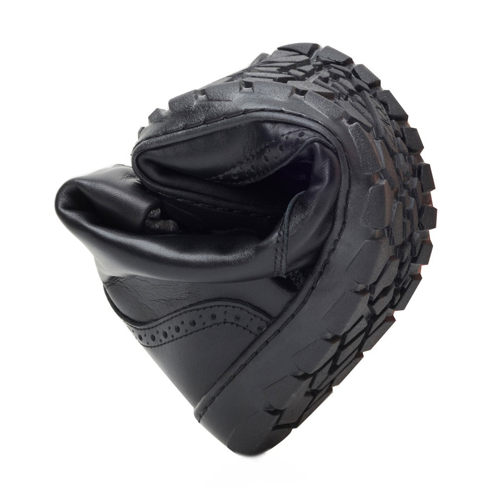The ZAQQ QUINTIC Brogue Black Waterproof is a stylish leather shoe with a robust, thick sole and outstanding flexibility. It features brogue detailing on the side and a textured sole for enhanced grip, while premium nappa leather ensures ultimate comfort and style.