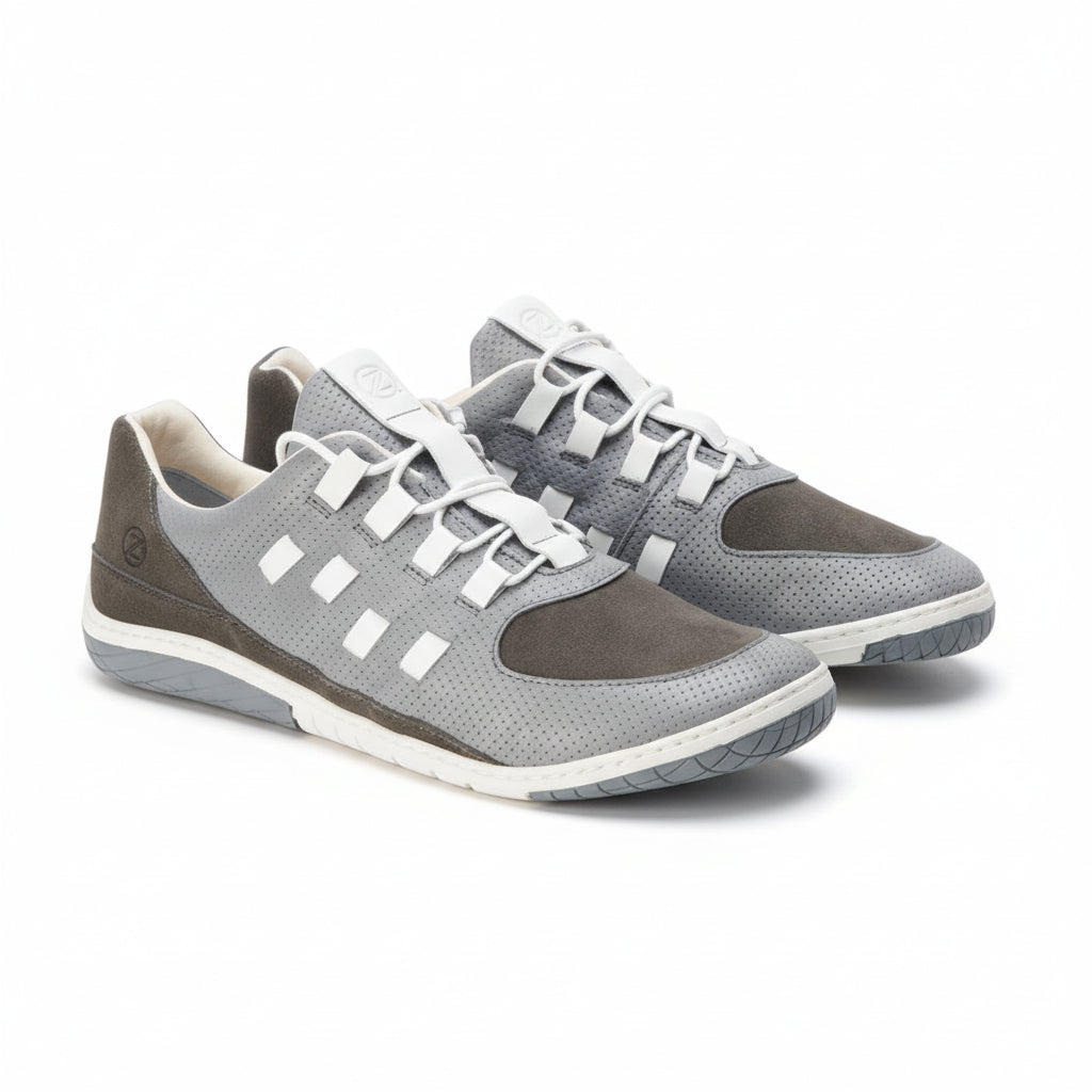 gray barefoot shoes sneakers made of perforated smooth leather and suede with white accents