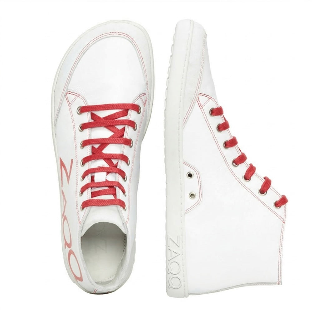 These stylish SQYLA White high-top sneakers from ZAQQ have red laces and seams. The side view highlights the red Z700 on the sole, while the top view highlights the clean design and round toe. Perfect for anyone looking for an ultra-modern sneaker with flair.